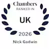 A circular laurel wreath surrounds the text: "Chambers Ranked in UK 2026 Nick Godwin" in dark blue on a white background.