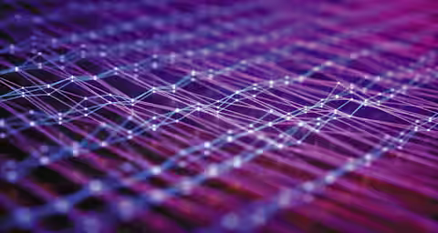 A close-up image depicting an abstract, interconnected network of glowing lines and nodes against a gradient background of purple, pink, and blue hues. The lines form a complex web, creating a futuristic and digital aesthetic.