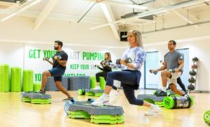 Group fitness class taking place in an indoor studio