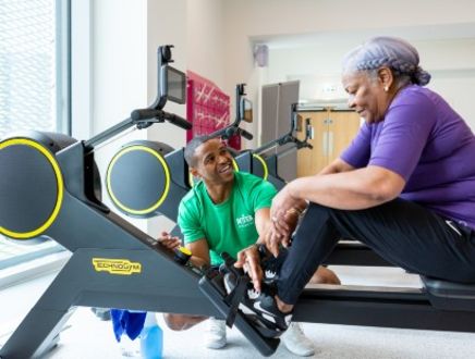 lady on rowing machine