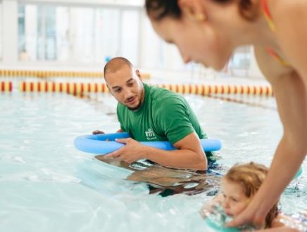 baby and parent learning to swim