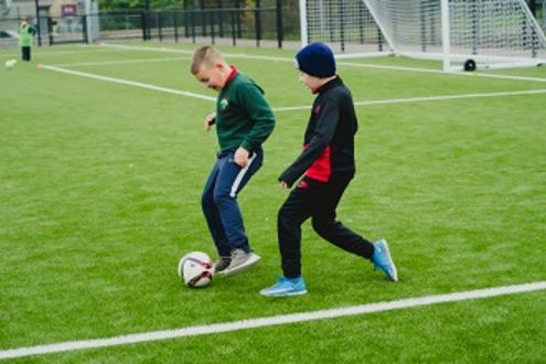 kids playing football