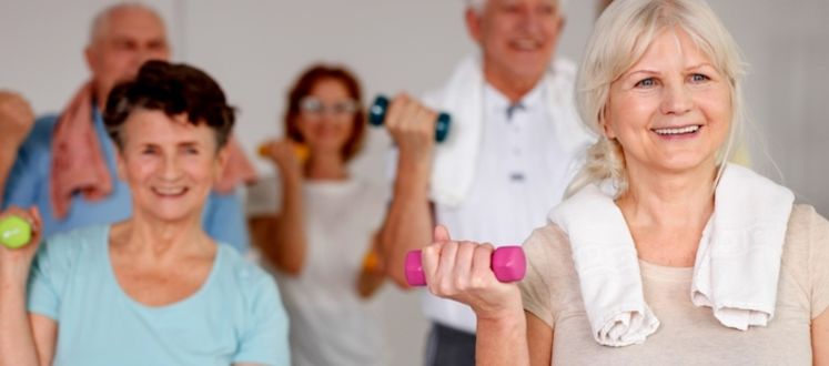 adults over 60 in a fitness class