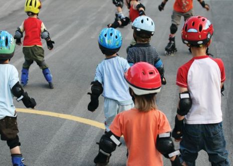 An image of children on roller and inline skates (rollerblades)