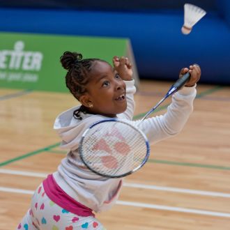 A child playing badminton