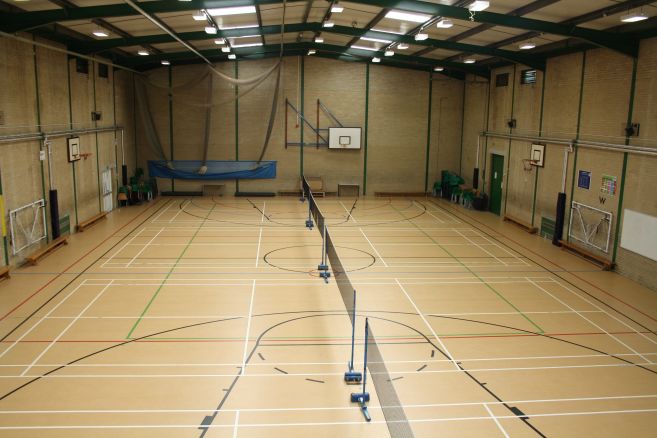 Indoor sports hall set up for badminton