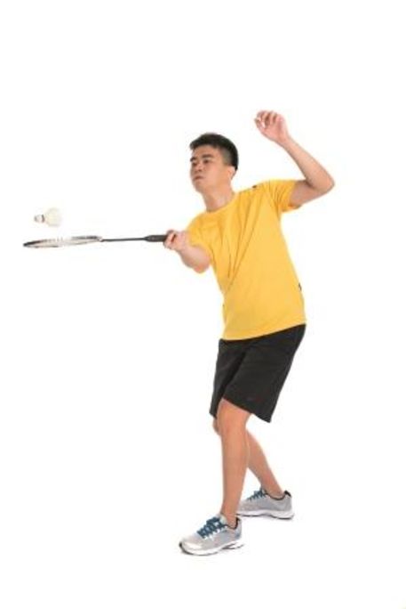 Man playing badminton