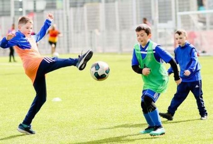 Kids playing football
