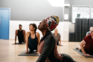 Woman doing yoga at Better