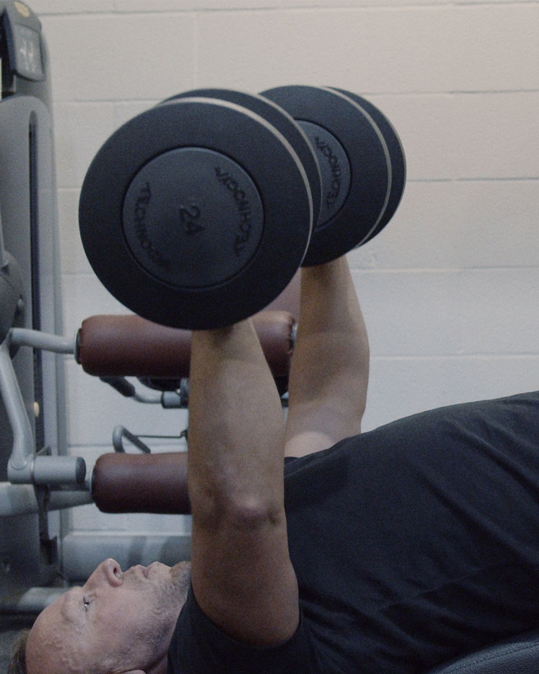 Steve lifting weights