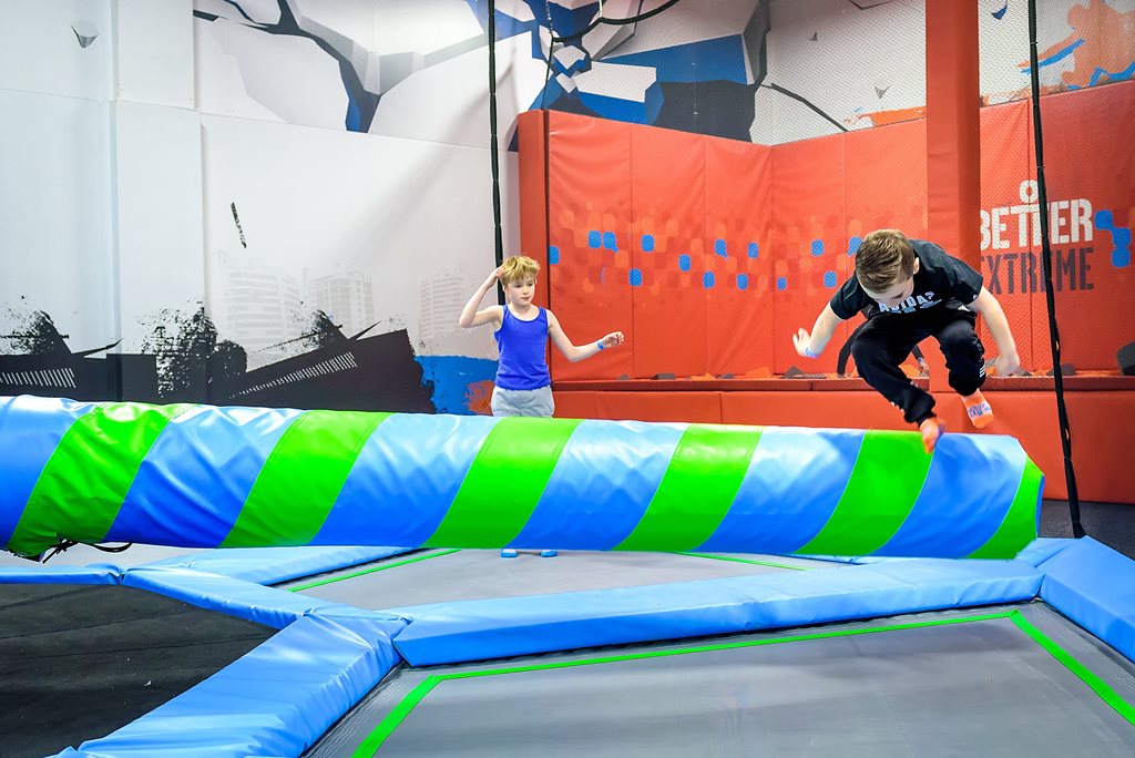 Children enjoying the wipeout area of the trampoline park at Bath Sports and Leisure Centre Children enjoying the wipeout area of the trampoline park at Bath Sports and Leisure Centre