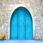 A Blue Door in an Old Stone Wall 
