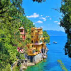 Yellow House by the Sea Surrounded by Trees in Portofino