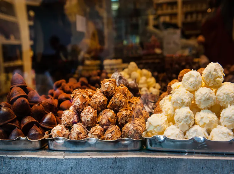 Piles of Chocolate Bonbons in the Window of a Belgian Chocolate Shop