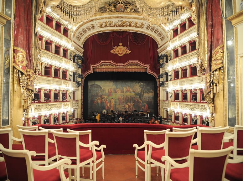 Theatre with Red Chairs and Galleries Overlooking a Stage