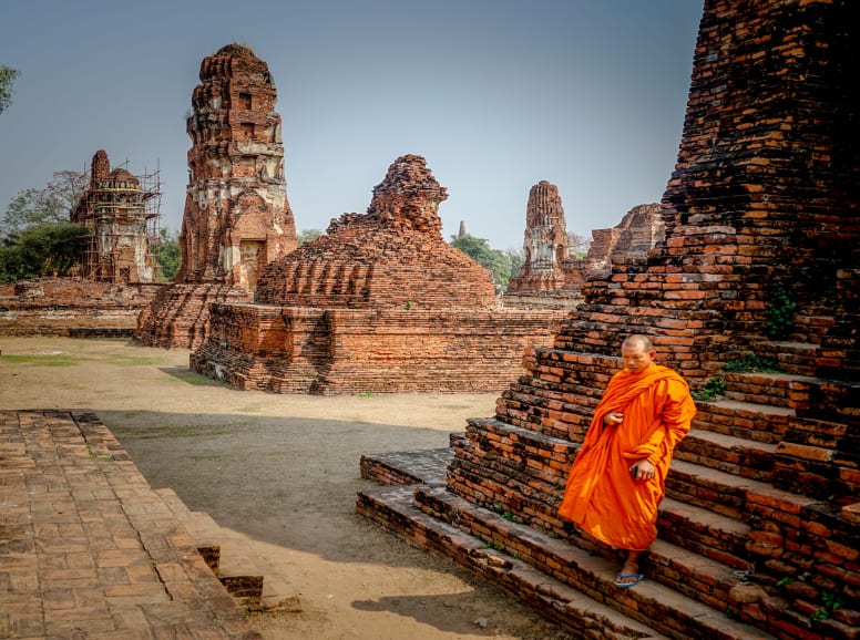 Monk Waking in Ancient Buddhist Temple in Ayutthaya