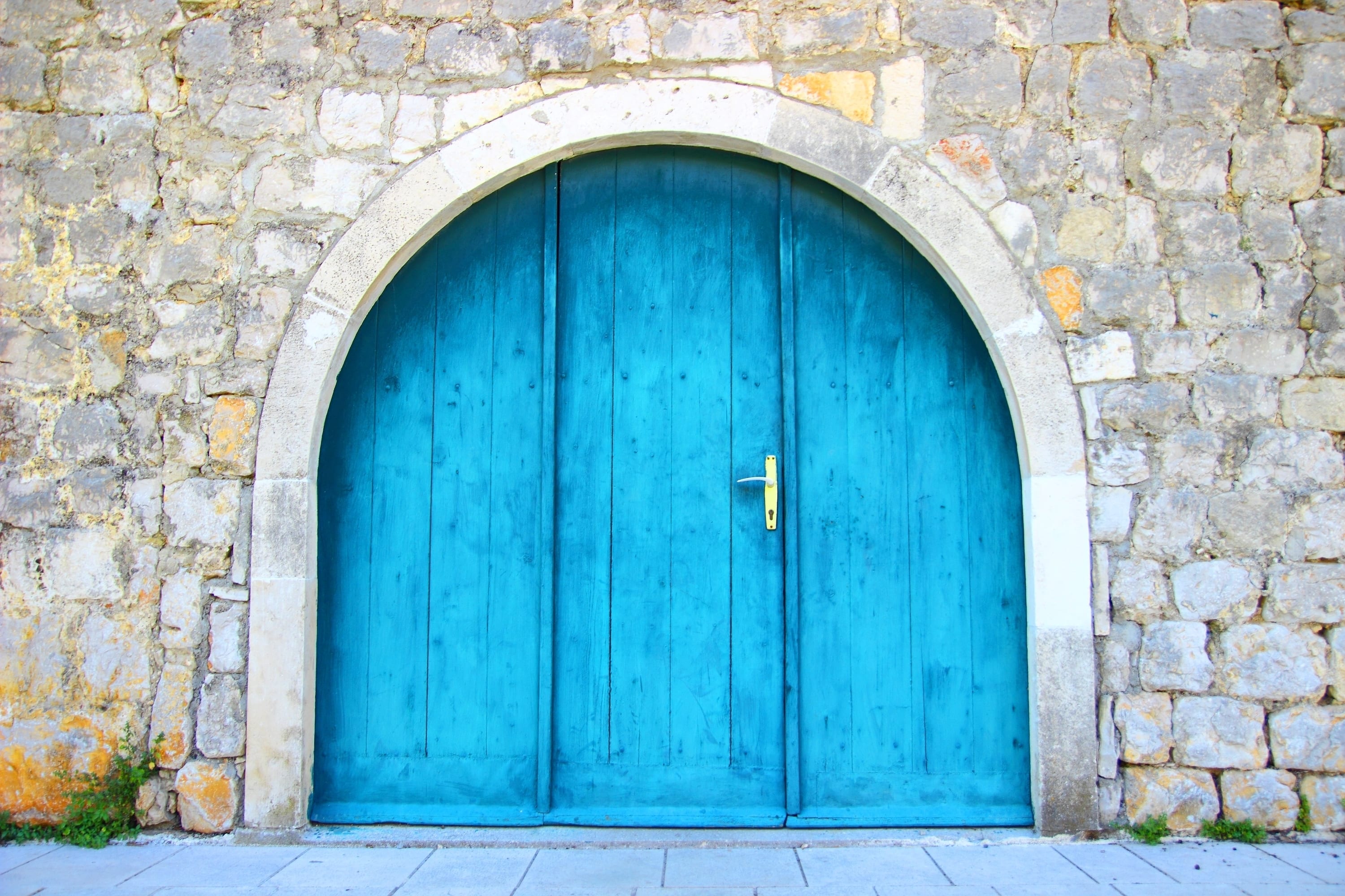 A Blue Door in an Old Stone Wall 