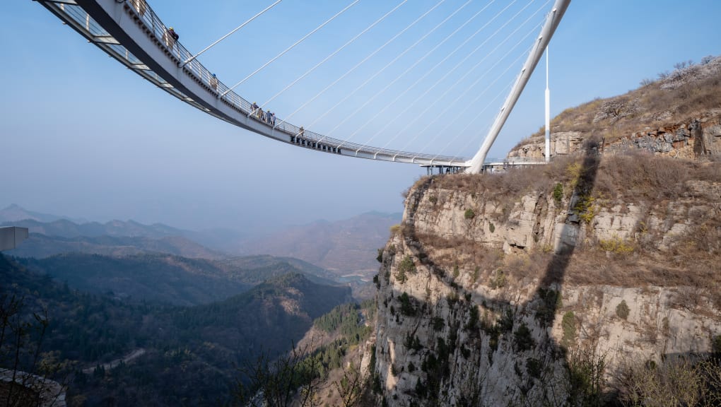 Wide angle view of the Tanxishan glass landscape pedestrian bridge