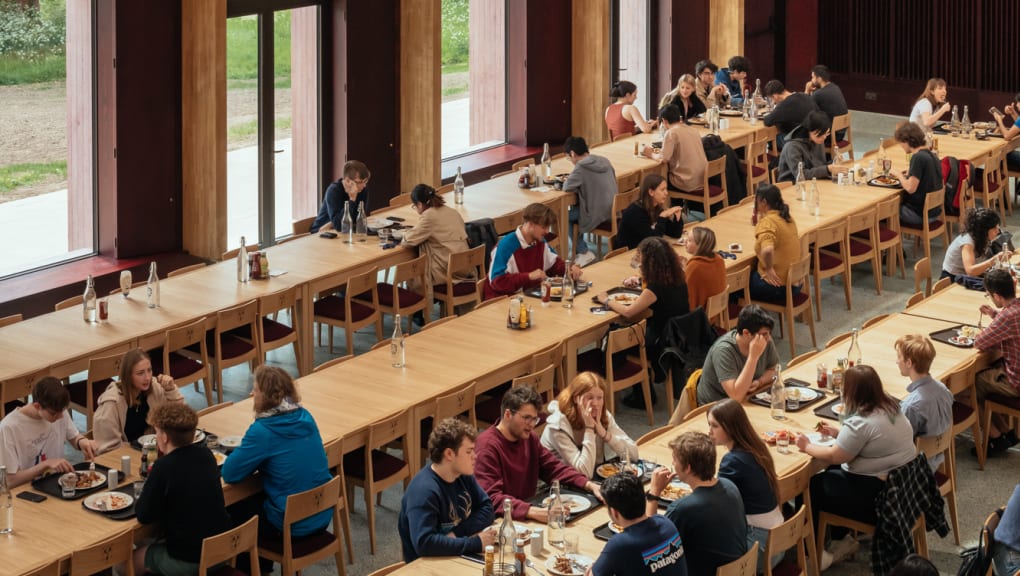 Interior view of people dining inside the Homerton Dining Hall