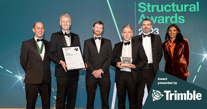 Holbein Gardens wins at 2023 Structural Awards receives award from Jamie Howarth at Trimble