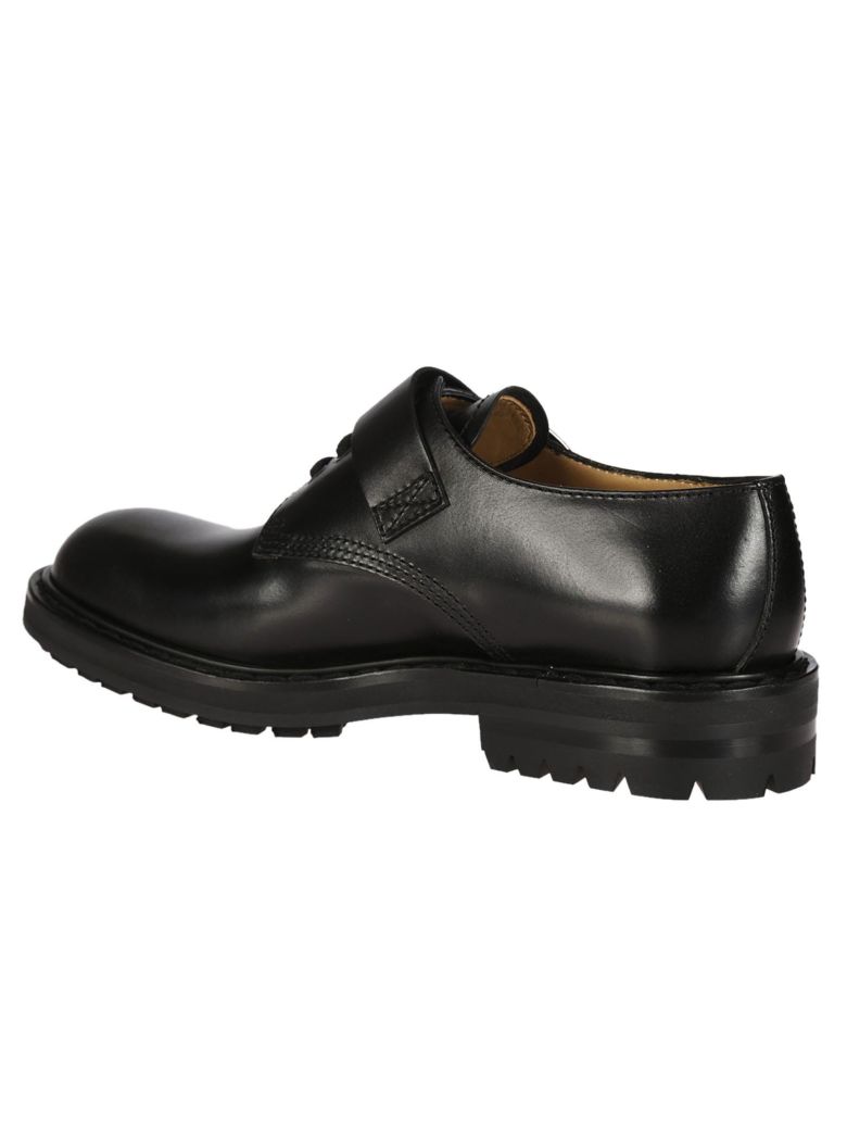 ALEXANDER MCQUEEN Buckled Derby Shoes in Black | ModeSens