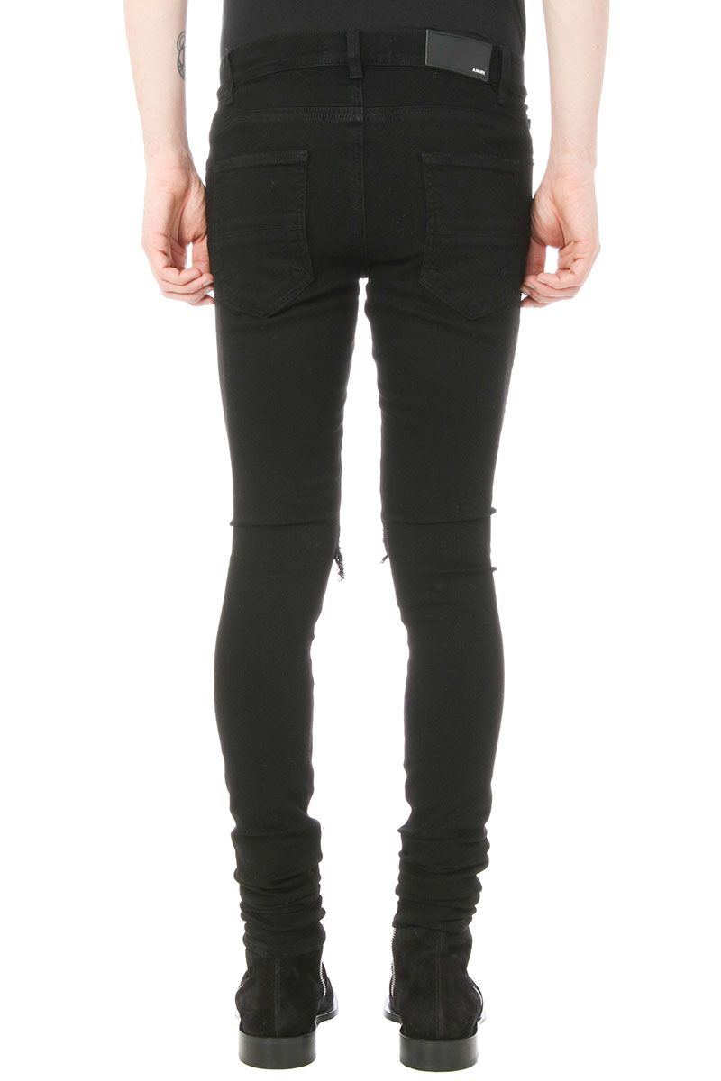 amiri black patch jeans