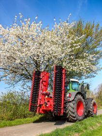 Kverneland F35 compact travelling on road with tractor