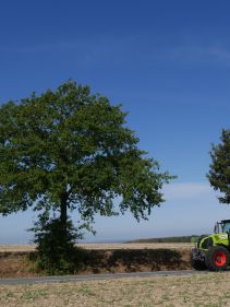 Kverneland U-drill, transported on road by tractor