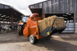 Kubota bale chopper loaded with hay