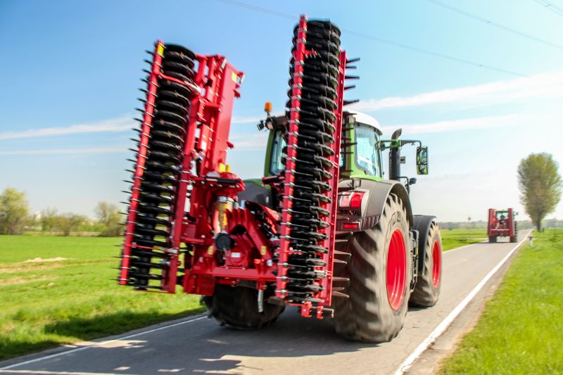 Kverneland F35 compact travelling on road with tractor