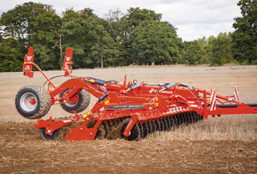 Disc Harrows - Kverneland-Qualidisc-Pro on field behind during operation