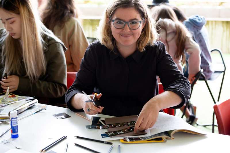 Bastian Fox Phelan creating a zine. 