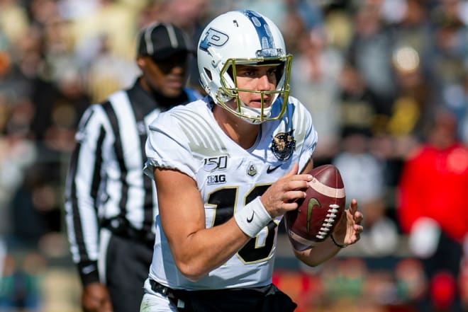 Purdue quarterback Jack Plummer taking snap against Maryland