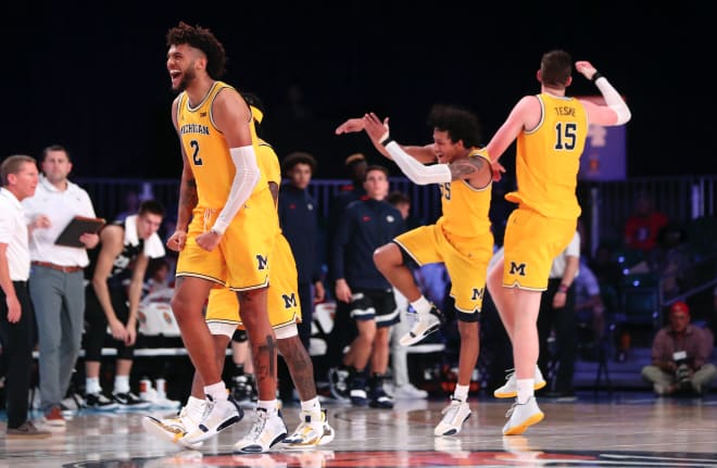 Michigan Wolverines basketball junior forward Isaiah Livers yelling