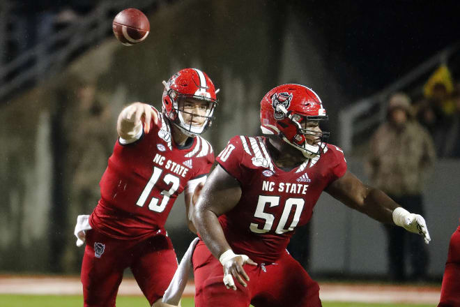 NC State Wolfpack football quarterback Devin Leary center Grant Gibson.