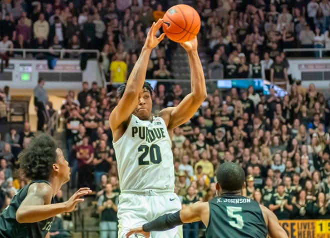 Purdue guard Nojel Eastern passes the ball.