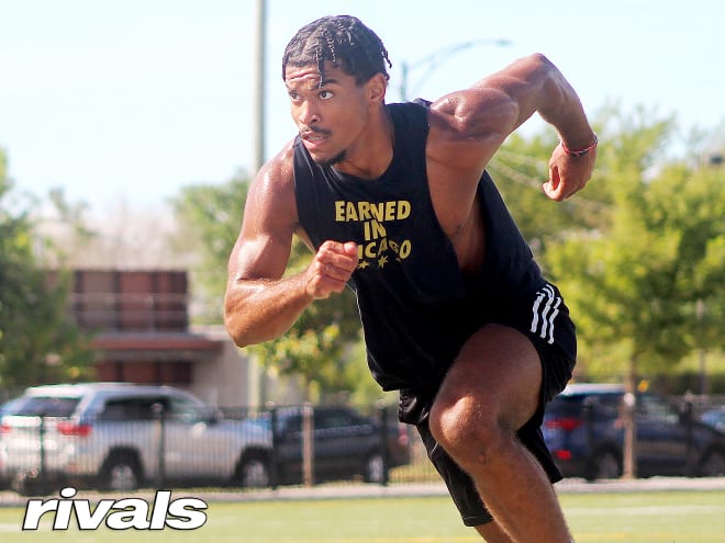 Chicago linebacker Sebastian Cheeks holds a Michigan Wolverines football recruiting offer from Jim Harbaugh.