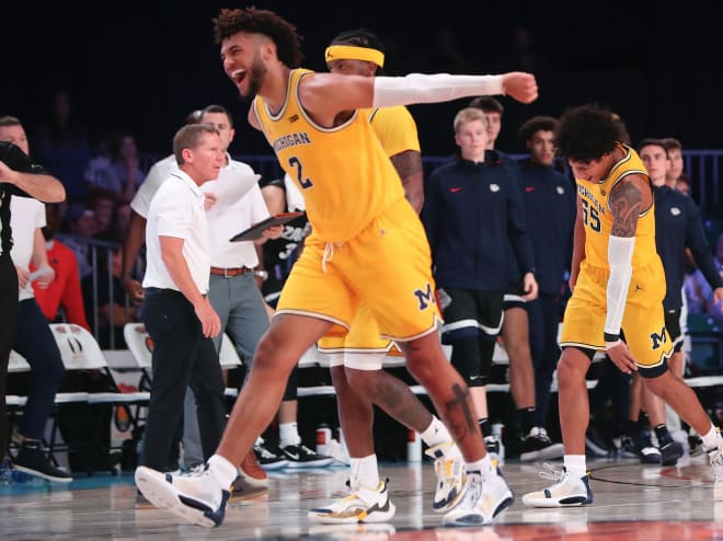 Michigan Wolverines basketball junior forward Isaiah Livers yelling
