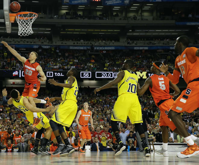 Former Michigan Wolverines basketball center Jordan Morgan (far left)