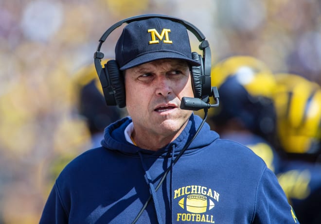 Jim Harbaugh and Michigan football open the season with Washington.