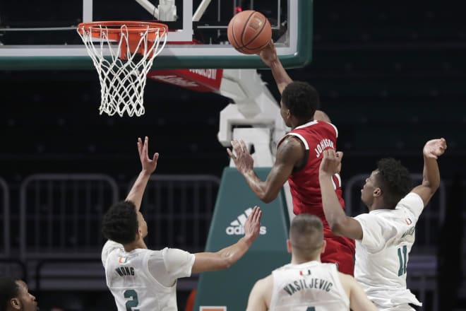 Senior NC State guard Markell Johnson drives to the basket.