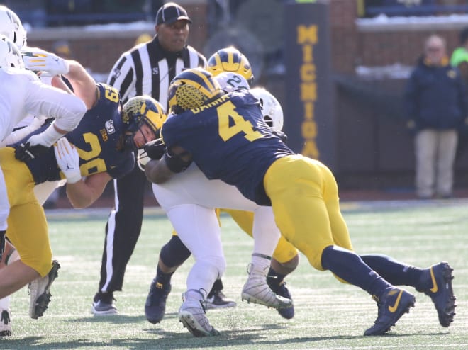 Former Michigan Wolverines football players Jordan Glasgow (left) and Michael Danna