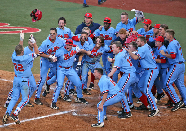 Ole Miss' Henri Lartigue arrives at home plate after hitting a game-winning home run Saturday against Kentucky. Lartigue and the Rebels close out the regular season this week at Texas A&M.