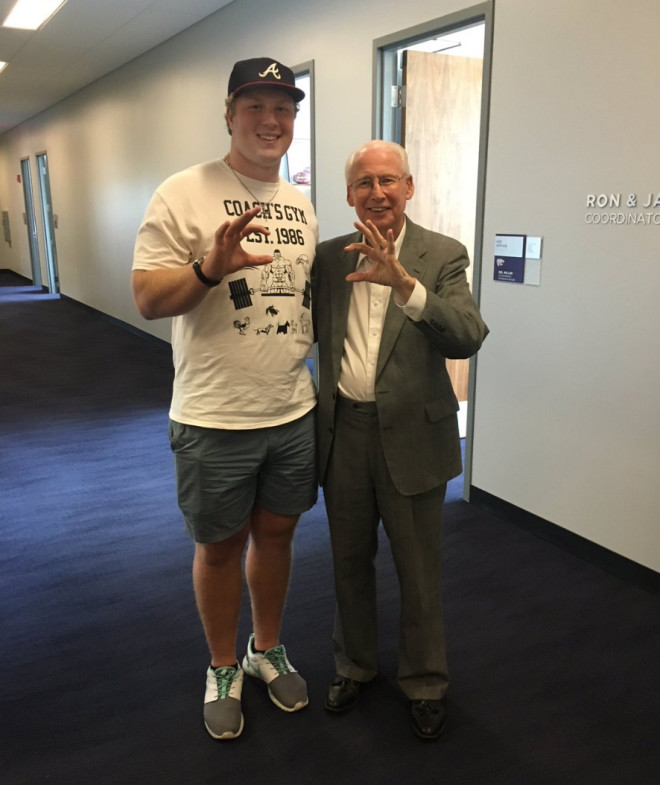 Huggins hit it off with Bill Snyder during an unofficial visit last month.