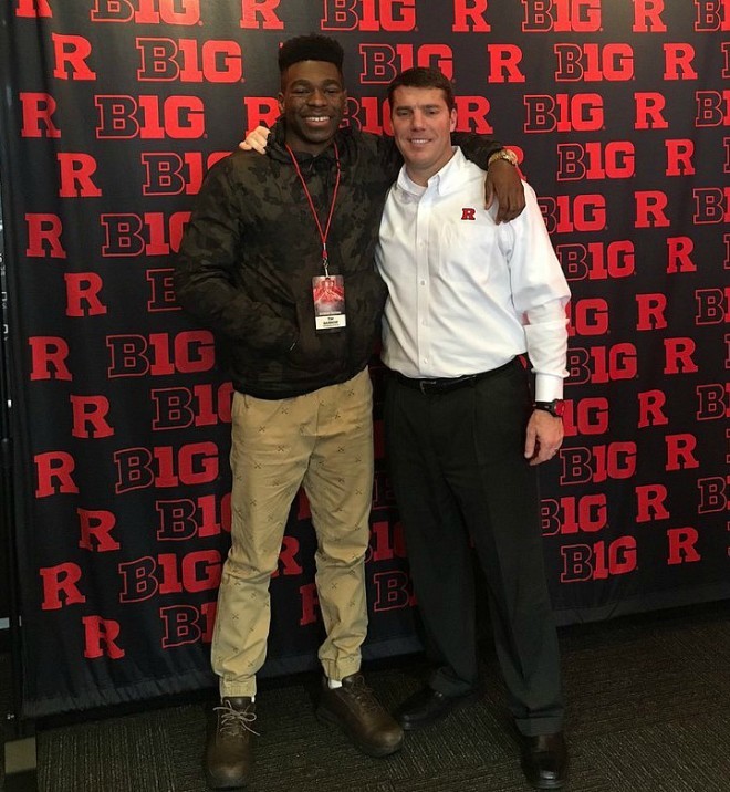 Barrow poses with RU head coach Chris Ash during junior day in February