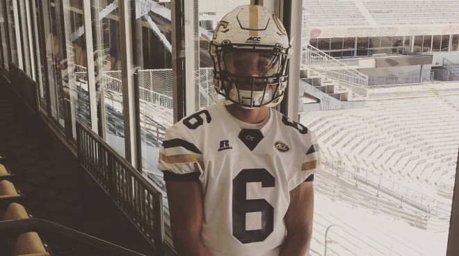 Taylor in GT gear during a visit to Georgia Tech