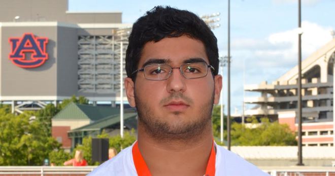 Navarre (Fla.) offensive lineman Nick Brahms left Auburn after BIG CAT with the Tigers No. 1.
