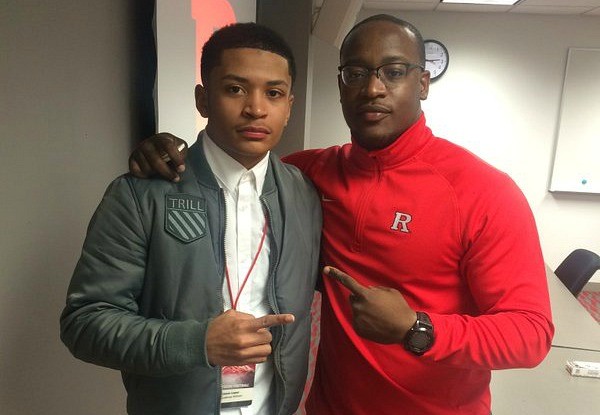 Edwin Lopez with RU Assistant DB coach Aaron Henry during a campus visit