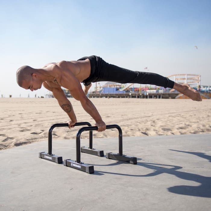 The Ultimate Guide To Mastering the L-Sit, Plance, and Handstand on  Parallettes