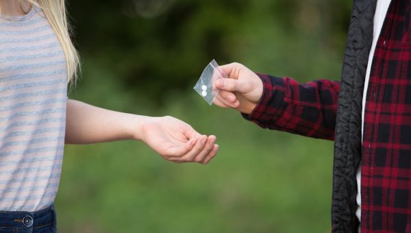 sharing illegal drugs